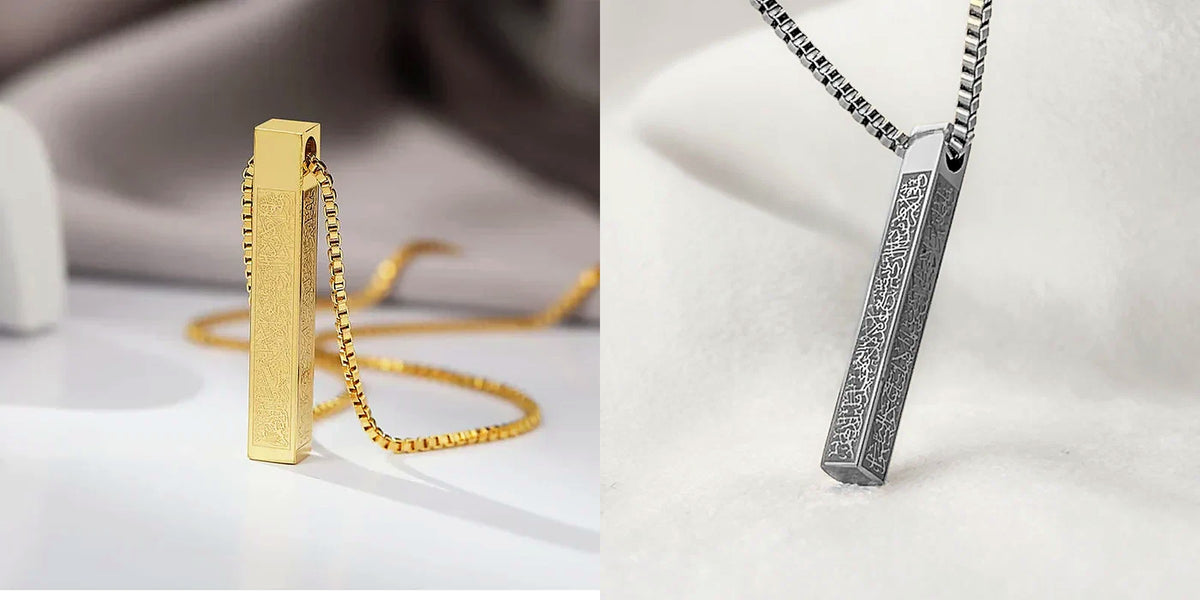Gold and silver Ayat ul Kursi bar necklaces side by side